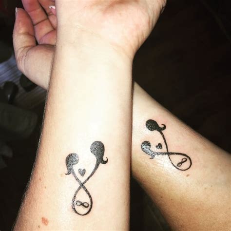 mother daughter tattoo meaning|sentimental mother daughter tattoos.